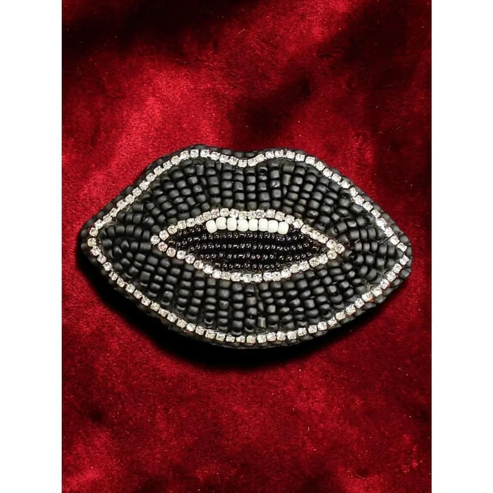 Designer's Murka Matte Black Beaded Lip Brooch with Crystal Accent